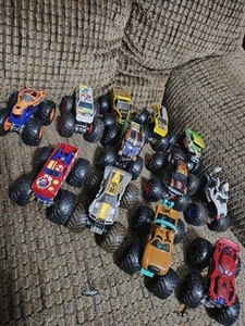 Hot Wheels Monster Jam Truck 12 Lot Super Mario Scooby Spiderman Mutt Potty 1:64 - Picture 1 of 9