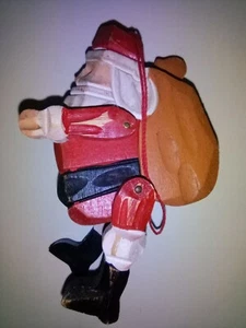 Christmas Ornament Wood Like Jointed Santa - Picture 1 of 2