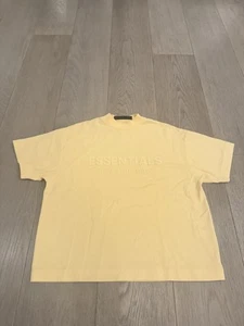 Kids Fear of God Essentials Garden Yellow Logo T-Shirt Youth 10 - Picture 1 of 4