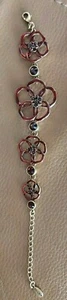 Pilgrim bracelet wit enamelled floral detail and sparkly stones in wine red - Picture 1 of 7