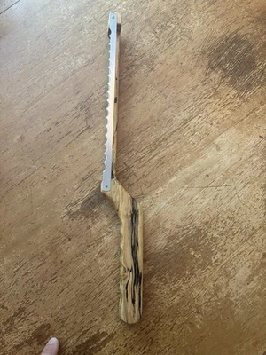 Cortadora de pan hecha a mano Foto 1 de 2