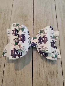 Moño de pelo irlandés de lucha Notre Dame moño Notre Dame - Imagen 1 de 1