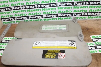 00-04 Nissan Xterra Frontier - пара солнцезащитных козырьков серые б/у оригинальное зеркало D - Изображение 1 из 4