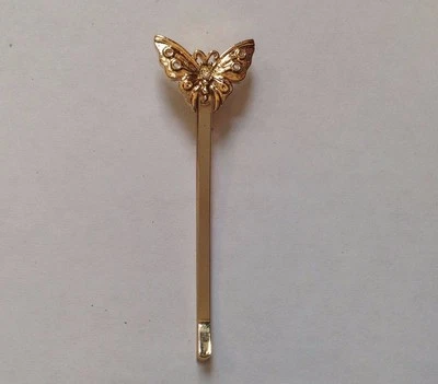 Pinza de pelo para mujer Butterfly Bobby tono dorado horquilla chapada en oro mariposa  Foto 1 de 4
