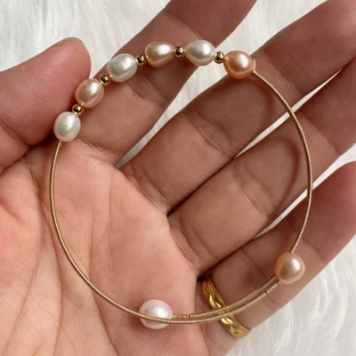 Stunning AAA 6-8mm rice shape natural south sea Multicolor pearl bracelet 14k - Image 1 of 4