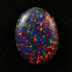 Cabujón ovalado de ópalo de fuego negro 15x11 mm 4,3 quilates AAA+ piedras preciosas sueltas australianas - Imagen 1 de 4