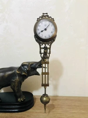 German Junghans Style Porcelain Dial Brass Elephant Swinging Clock - Image 1 of 4