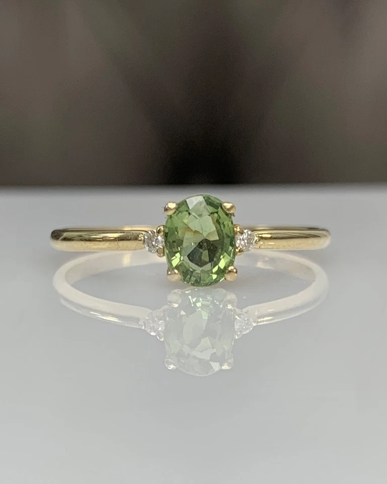 Simulated 0.63CT Peridot & Moissanite Women 3 Stone Ring In 10K Yellow Gold - Image 1 of 4