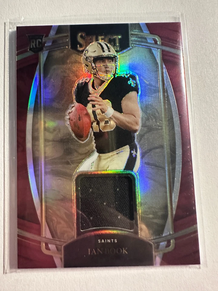 K117,672 - 2021 Select Rookie Swatches Prizm Red #19 Ian Book Jersey - Image 1 of 1