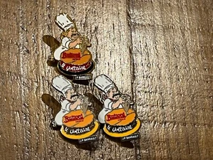 3 PIN PINS CHEF CUISINE BUITONI LE VOLATAIRE ARTHUS BERTRAND 1 DORE ET 2 ARGENT - Imagen 1 de 2
