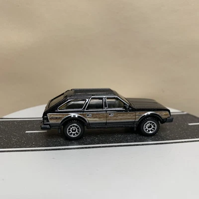 2024 Matchbox 22/100 1980 AMC Eagle Wagon Black Mtflk w/Wood Panels 1:64 NM - Image 1 of 4