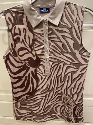 Camisa polo sin mangas de golf Daily Sports para mujer talla M mediana con estampado animal cebra Foto 1 de 4