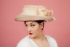 Cream and pink toned 2 layered feather and beaded formal hat by Mad Hatters