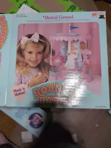 Carruaje musical 10A de l Boucin' Babies de Galoob no probado sin bebés - Imagen 1 de 15
