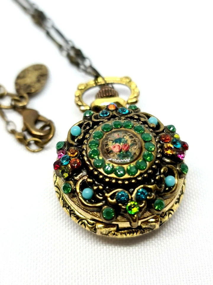 Reloj colgante vintage con piedras de cristal de colores de Michal Negrin. Foto 1 de 4
