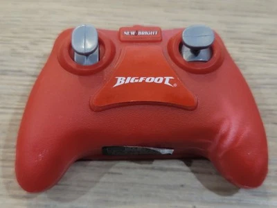 New Bright 1:43 RC Bigfoot Monster Truck Remote Control Only FCC ID: G6D41HB2 - Image 1 of 4