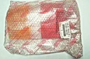 TOYOTA-81561-89163 HILUX REAR COMBO LIGHT LENS LHS - GENUINE OEM PART - Picture 1 of 9