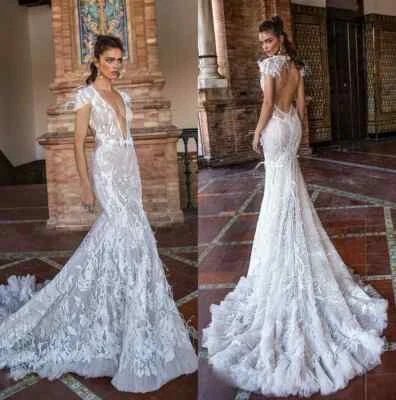 Sexy Mermaid Wedding Dresses Deep V-Neck with Feathers Sweep Train Bridal Gowns - Image 1 of 4