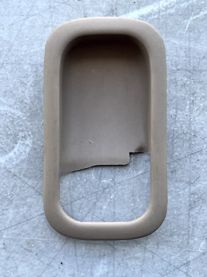 1999 NISSAN MAXIMA REAR INTERIOR DOOR HANDLE BEZEL TRIM COVER LEFT SIDE- TAN OEM - Image 1 of 3