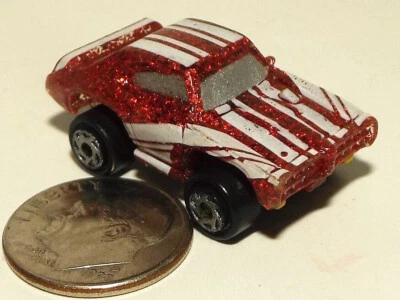Small Micro Machine Plastic 1968 Pontiac GTO in Metallic Red with White Stripes - Image 1 of 3