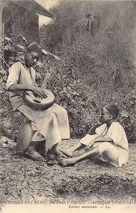 British East Africa - Young boy playing guitar - Publ. Missions of the Fathers o - Picture 1 of 2