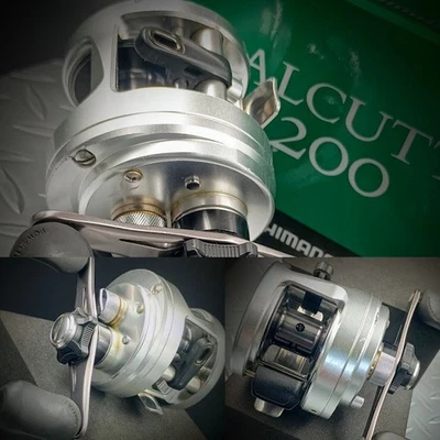 SHIMANO【12 CALCUTTA 200】R-H 5.7:1 GR Used Baitcasting Reel "Ex+"cond. W/Box - Image 1 of 4