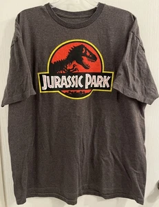 Camisa JURASSIC PARK Para Hombre 2XL Dinosaurio Parque Temático Película Fan Camiseta Gris - Imagen 1 de 4