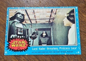 1977 Topps Star Wars #17 Lord Earth Vader amenaza a la princesa Leia - Imagen 1 de 2