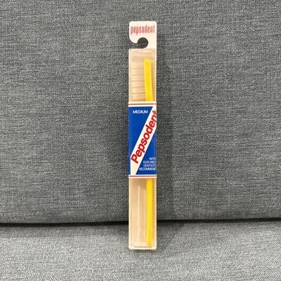 Cepillo de dientes Pepsodent vintage nuevo de stock - mediano - vintage - (propulsor de película) - amarillo Foto 1 de 4