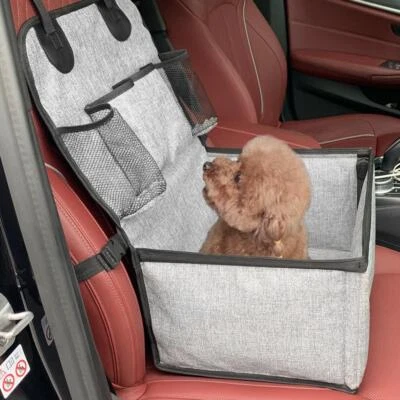 Asiento de coche para perros, asiento elevador para cachorros para asiento delantero de coche con bolsillos de almacenamiento, abucheos para mascotas Foto 1 de 4