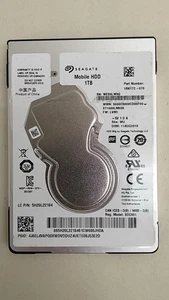 Disque dur pour ordinateur portable Seagate ST1000LM035 Mobile HDD 1 To 2,5" SATA III - Photo 1/3