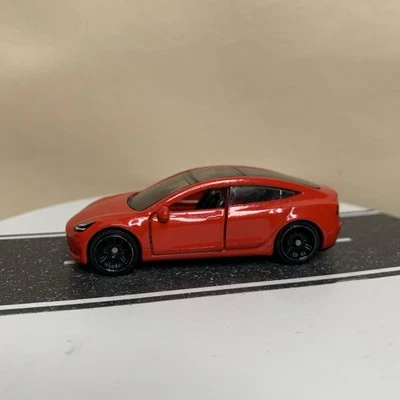 Matchbox Moving Parts Tesla Model 3 Sedan EV Red 70 Years w/Black Wheels 1:64 NM - Image 1 of 4