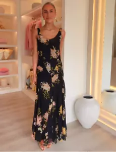 ZARA 2025 NUEVO CON ETIQUETAS. VESTIDO MIDI NEGRO NARANJA ESTAMPADO FLORAL TIRANTES. 2718/100/056 - Imagen 1 de 11