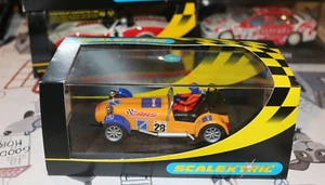 Scalextric C2731 Caterham 7 Comma Orange MINT/BOXED, Rare Car L@@K!! - Picture 1 of 1