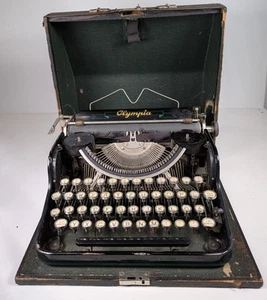Olympia, machine à écrire avec étui, manque de pièces, #KN14 - Photo 1/11
