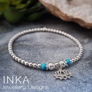 Sterling Silver Turquoise LOTUS Charm BRACELET 925 Stretch Stacker By INKA - Picture 1 of 6
