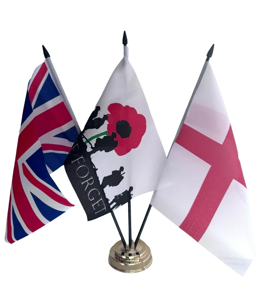 LEST WE FORGET and UNION JACK and ST GEORGE TABLE FLAG SET of 3 flags and base - Image 1 of 1
