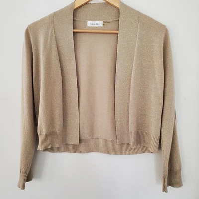 CALVIN KLEIN M Metálico Dorado Tostado Recortado Tejido Encogerse de hombros Manga 3/4 Estilo Abierto Usado en Excelente Condición Foto 1 de 4