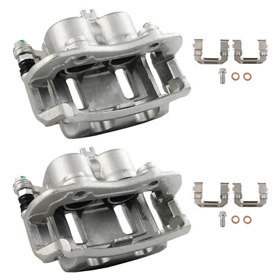 Par de pinzas de freno delanteras para 00-04 Nissan Xterra 03-04 Frontier con soporte Foto 1 de 4