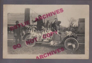 Scribner NEBRASKA RPPC c1918 JACKRABBIT HUNT Hunters Posing DEAD RABBITS Car NE - Picture 1 of 3