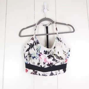 Reggiseno sportivo Nike Dri Fit donna TG XL floreale elasticizzato yoga palestra sport senza cuscinetti - Foto 1 di 7