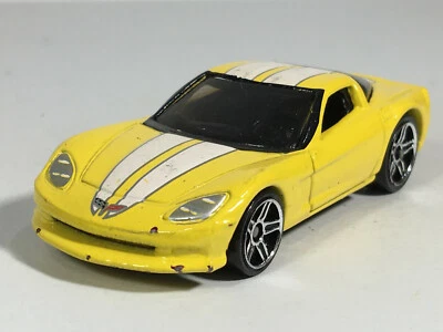 Chevy C6 Corvette 2007 Hot Wheels esmalte amarillo claro con autos misteriosos HW blancos Foto 1 de 4