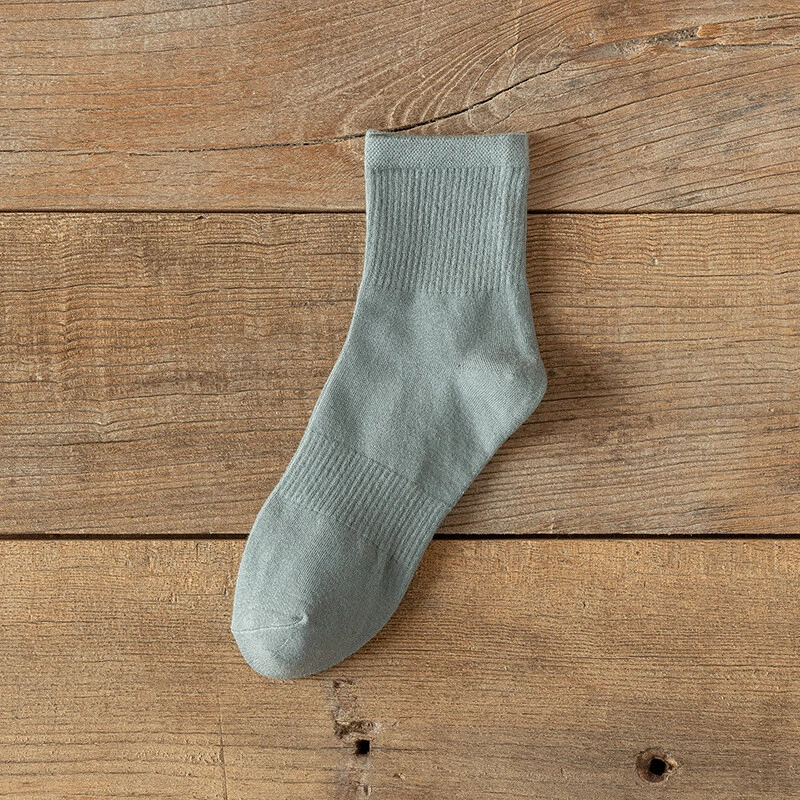 5 pares de calcetines medianos desodorantes deportivos de algodón de color liso para mujer Foto 1 de 4