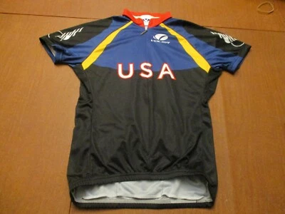 CAMISETA DE CICLISMO VOLER BRAND TEAM EUA 3/4 ZÍPER - FEMININA SM FEITA NOS EUA RACE RAGLAN - Imagem 1 de 4