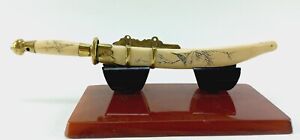 Mini samurai sword letter opener antique brass handle and 1920s plastic 