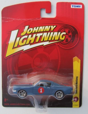 JOHNNY LIGHTNING FOREVER 64 R19 1965 FORD MUSTANG FASTBACK Creased Card #108-109 - Image 1 of 2