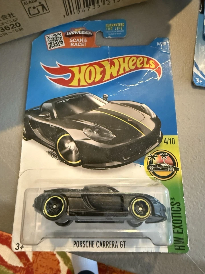 Hot Wheels HW Exotics Porsche Carrera GT Black Matte Yellow Line Collectible Toy - Image 1 of 1