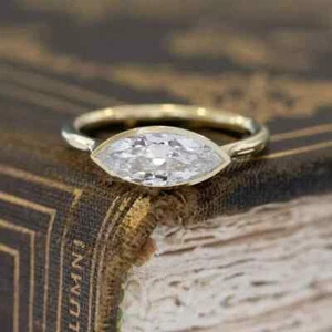 Marquise Lab Created Diamond East to West Bezel Ring In 14K Yellow Gold Plated - Picture 1 of 9