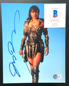 FOTO 8X10 FIRMADA POR LUCY SIN LEY PRINCESA GUERRERA XENA HERCULES ESPARTACO BAS A - Imagen 1 de 2