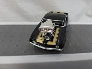 Muscle Machines 1969 Chevy Camaro Black Gold Stripes Die Cast 1:64 - Picture 1 of 6